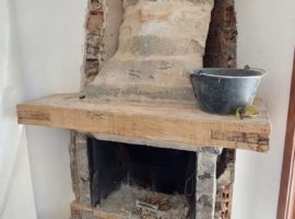 Démontage d'une cheminée et rhabillage des murs par FS Habitat